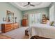 Bright main bedroom with large windows, walk-in closet, and comfortable seating at 1535 W Winter Dr, Phoenix, AZ 85021