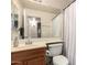 Bathroom featuring a sink, toilet, mirror, and shower with a white curtain at 2056 E San Tan Ct, Gilbert, AZ 85296