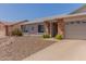Charming single-story home with a two-car garage, low-maintenance landscaping, and inviting curb appeal at 2056 E San Tan Ct, Gilbert, AZ 85296