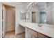 Bathroom showcasing spacious vanity and sink, bright tile flooring at 2822 N 90Th Ave, Phoenix, AZ 85037