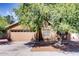 Charming single-Gathering home featuring a two-car garage and mature landscaping in a residential neighborhood at 2822 N 90Th Ave, Phoenix, AZ 85037
