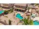 An aerial shot of an outdoor living space featuring a custom pool with mature plants at 31453 N Blackfoot Dr, San Tan Valley, AZ 85143