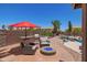 Backyard patio and pool area features a built-in grill and outdoor seating area at 31453 N Blackfoot Dr, San Tan Valley, AZ 85143