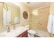 Updated bathroom featuring glass shower, modern faucet, light fixtures and vanity sink with cabinet at 31453 N Blackfoot Dr, San Tan Valley, AZ 85143