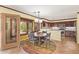 Bright kitchen nook with a round wood table and seating for four by windows with natural light at 31453 N Blackfoot Dr, San Tan Valley, AZ 85143