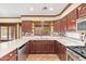 Spacious kitchen with updated appliances, ample counter space, and stylish backsplash at 31453 N Blackfoot Dr, San Tan Valley, AZ 85143
