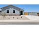 Charming single-story home with a well-manicured front yard and a two-car garage in a Gathering-friendly neighborhood at 317 S San Christo Ln, Casa Grande, AZ 85194