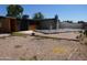 A view of the backyard with pool covered and ready for updates at 3171 W Orchid Ln, Phoenix, AZ 85051