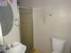 Bathroom showcasing a shower stall, toilet, and sink at 3171 W Orchid Ln, Phoenix, AZ 85051