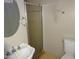 Bathroom showcasing a shower stall, toilet, and sink at 3171 W Orchid Ln, Phoenix, AZ 85051