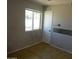 This bedroom includes a window and tile floors at 3171 W Orchid Ln, Phoenix, AZ 85051