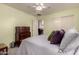 Comfortable bedroom featuring a ceiling fan, plush carpet, and soft colors at 3274 E Denim Trl, San Tan Valley, AZ 85143