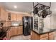 Well-equipped kitchen with granite countertops, center island and stainless steel appliances with pantry access at 3274 E Denim Trl, San Tan Valley, AZ 85143