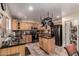 Well-equipped kitchen with granite countertops, a center island and stainless steel appliances at 3274 E Denim Trl, San Tan Valley, AZ 85143