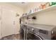 Functional laundry room featuring a modern washer and dryer, and ample storage at 3274 E Denim Trl, San Tan Valley, AZ 85143