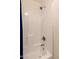 Clean and bright bathroom shower with white tiling and modern showerhead at 3274 E Denim Trl, San Tan Valley, AZ 85143