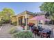 Outdoor patio featuring a dining table, chairs, couch, and an umbrella at 3406 E Pyrenees Pass, Phoenix, AZ 85018