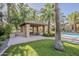 Shaded community pavilion offers a delightful space for relaxation and socializing, adjacent to the community pool at 3406 E Pyrenees Pass, Phoenix, AZ 85018