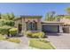 Charming single-story home with well-manicured landscaping, a tile roof, and a two-car garage at 3406 E Pyrenees Pass, Phoenix, AZ 85018