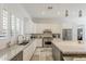 Well-lit kitchen featuring stainless steel appliances, granite countertops, and tile flooring at 3406 E Pyrenees Pass, Phoenix, AZ 85018