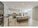 Stylish open kitchen with a large center island, stainless steel appliances, and a modern design at 3406 E Pyrenees Pass, Phoenix, AZ 85018