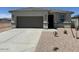 Charming single-story home with neutral stucco, concrete driveway, and well-maintained desert landscaping at 38070 W Frascati Ave, Maricopa, AZ 85138
