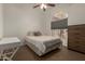 Bright bedroom featuring a cozy bed, natural light, and a convenient workspace at 3946 N 112Th Ave, Avondale, AZ 85392