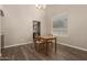 Cozy dining area with a wooden table set, perfect for intimate meals and gatherings at 3946 N 112Th Ave, Avondale, AZ 85392