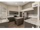 Bright kitchen featuring granite counters, tiled backsplash, stainless steel appliances, and center island at 3946 N 112Th Ave, Avondale, AZ 85392