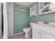 A clean bathroom with a toilet, sink, and shower at 4065 E University Dr # 228, Mesa, AZ 85205