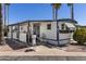 Charming single Gathering home in a park with desert landscaping and covered entryway at 4065 E University Dr # 228, Mesa, AZ 85205