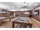 Spacious game room featuring multiple pool tables and modern lighting fixtures for entertainment at 4065 E University Dr # 228, Mesa, AZ 85205