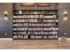 Extensive library with floor-to-ceiling bookshelves and stylish decor, perfect for reading at 4065 E University Dr # 228, Mesa, AZ 85205
