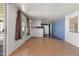 Bright Living Room and Kitchen featuring wood look floors, open floor plan and neutral colors at 4065 E University Dr # 228, Mesa, AZ 85205