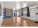 Bright living room with wood floors, an open floor plan and sliding glass door at 4065 E University Dr # 228, Mesa, AZ 85205