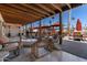 Relaxing community outdoor patio with lounge area, perfect for entertaining and enjoying the desert weather at 4065 E University Dr # 228, Mesa, AZ 85205