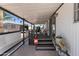 Relaxing covered patio with seating area, providing shade and outdoor living space at 4065 E University Dr # 228, Mesa, AZ 85205