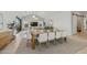 Open-concept dining area offering a seamlessly integrated living space with a slider to the backyard at 42065 N Cutbow Trl, San Tan Valley, AZ 85140