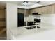 Modern kitchen featuring stainless steel appliances and bright countertops at 4242 N 69Th Dr # 1303, Phoenix, AZ 85033