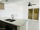 Kitchen with white countertops and stainless steel sink at 4242 N 69Th Dr # 1303, Phoenix, AZ 85033