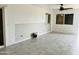 Bright living room with tile floors and windows with partial coverings at 4242 N 69Th Dr # 1303, Phoenix, AZ 85033