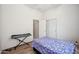 Bedroom offers hardwood floors, a ceiling fan and a closet at 4414 W Monte Way, Laveen, AZ 85339
