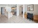 Bright kitchen area with stainless steel refrigerator, breakfast bar, and desk area at 4414 W Monte Way, Laveen, AZ 85339