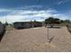 Backyard with gravel and a patio, perfect for outdoor relaxation at 513 S Cardinal Dr, Apache Junction, AZ 85120
