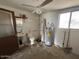 Bathroom with a vintage-style sink, toilet, and tiled shower for essential hygiene at 513 S Cardinal Dr, Apache Junction, AZ 85120