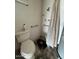 Close-up of the shower and toilet in the bathroom; basic washing and cleaning necessities at 513 S Cardinal Dr, Apache Junction, AZ 85120