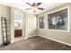Comfortable bedroom with abundant natural light and an adjacent bathroom at 530 S Emerson St, Chandler, AZ 85225