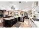 Open-concept kitchen boasting a large island, modern appliances, and seamless flow to living spaces at 530 S Emerson St, Chandler, AZ 85225