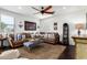 Bright living room features shiplap accent wall, modern ceiling fan, and cozy furniture at 530 S Emerson St, Chandler, AZ 85225
