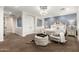 Tranquil bedroom showcasing a stylish chandelier, decorative accents, and ample space at 530 S Emerson St, Chandler, AZ 85225